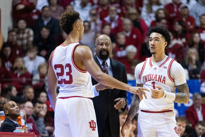 Indiana Hoosiers head coach Mike Woodson talks with Indiana Hoosiers forward Trayce Jackson-Davis (23) and guard Jalen Hood-Schifino (1) in the first half against the Michigan State Spartans at Simon Skjodt Assembly Hall.